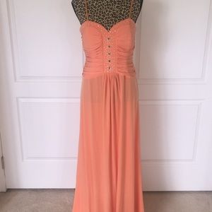Orange Long gown with opal and crystal details.